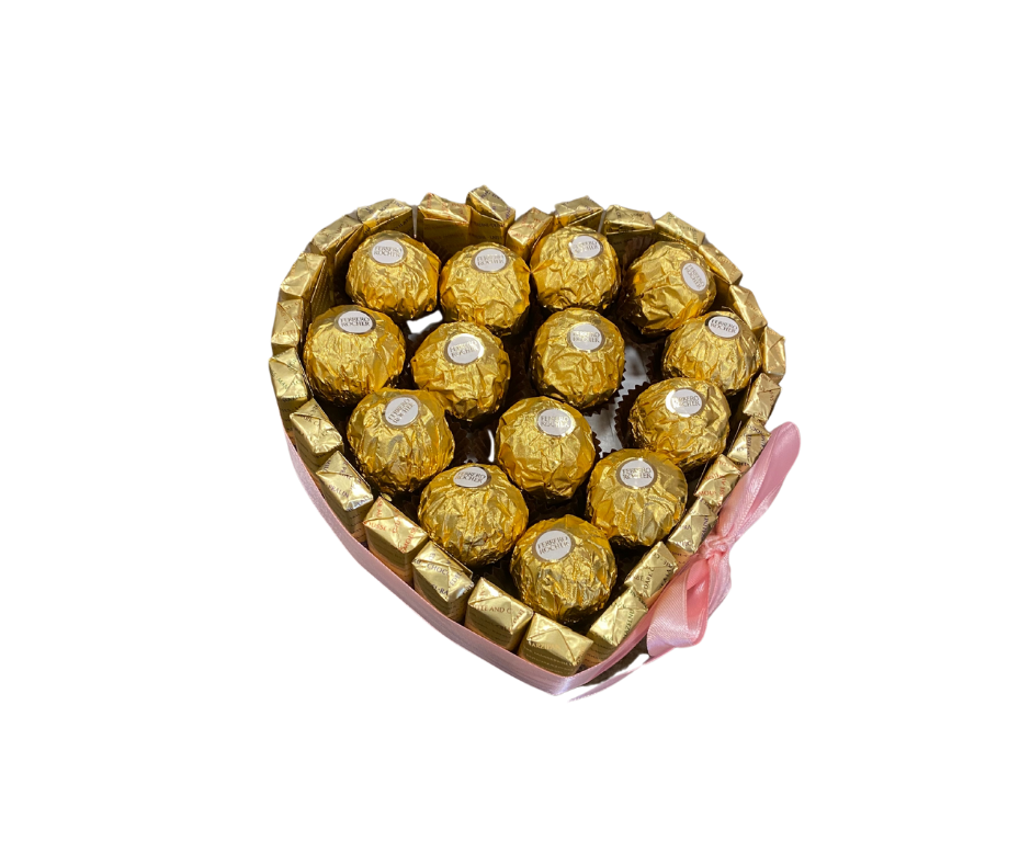 Moederdag cadeau nodig? Verras je moeder met een hartvormige doos vol Ferrero Rocher, afgewerkt met een zachte roze strik – stijlvol en vol liefde