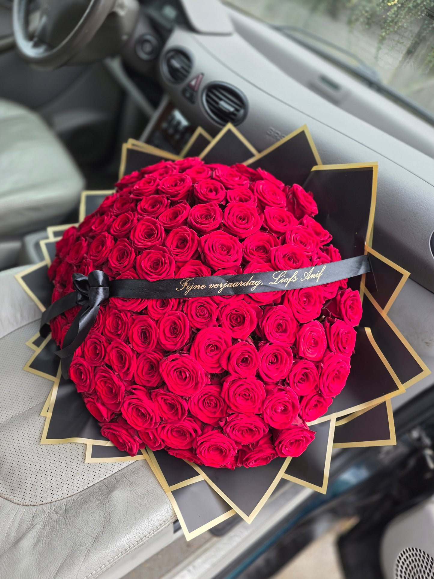 100 red naomi rozen boeket